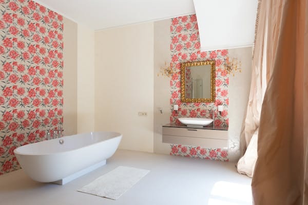 bathroom with beautiful wallpapered walls
