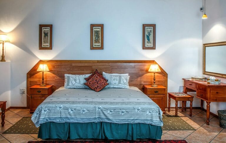 bed with wooden headboard