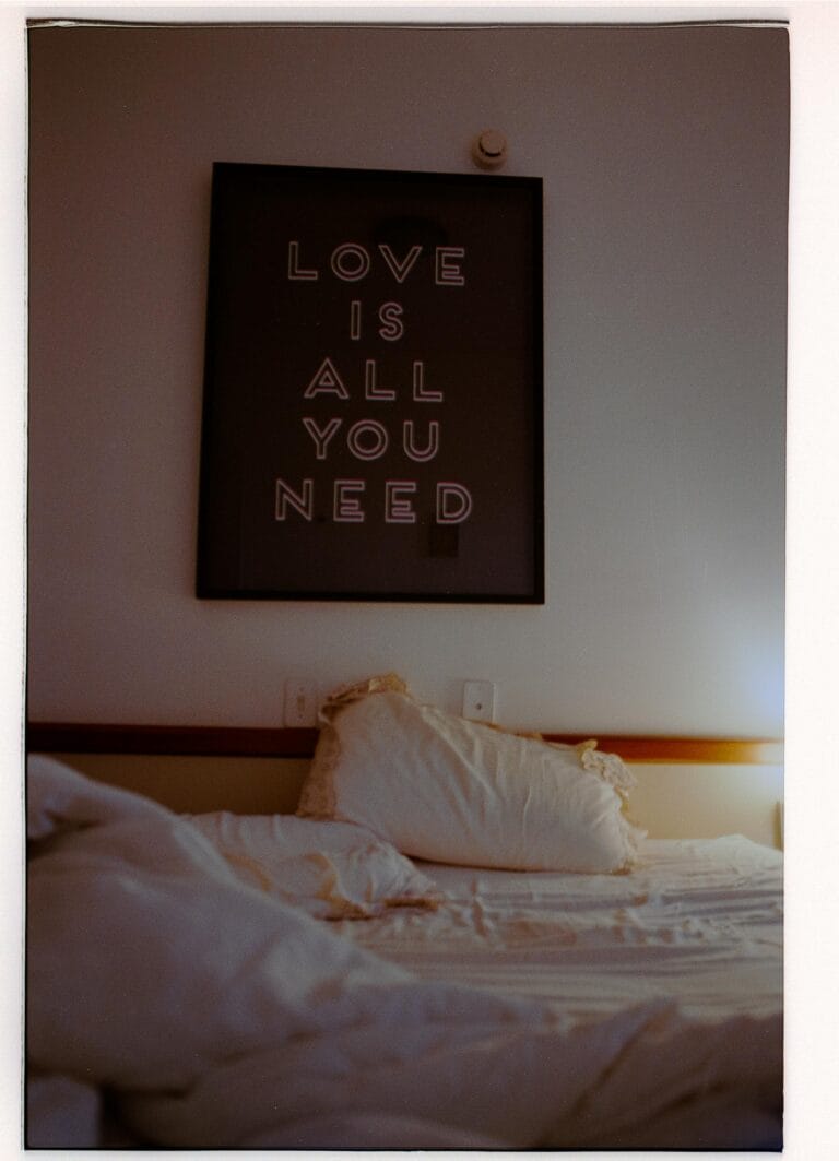 bedroom with inspirational quotes as art